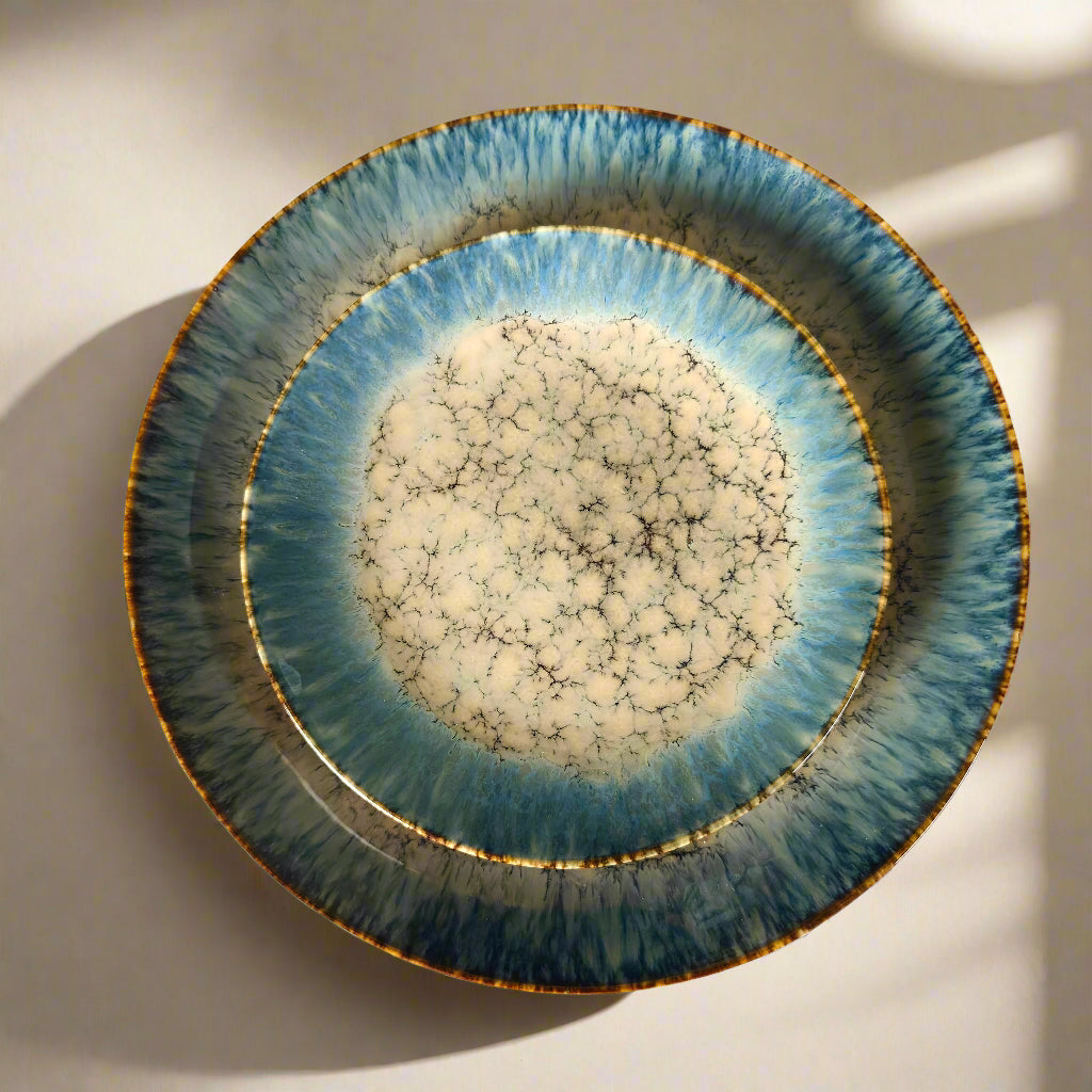 Decorative ceramic plate with a unique texture on a patterned background