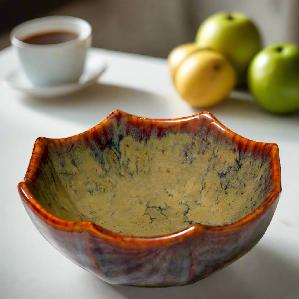 Ceramic bowl with a textured surface on a white tablecloth