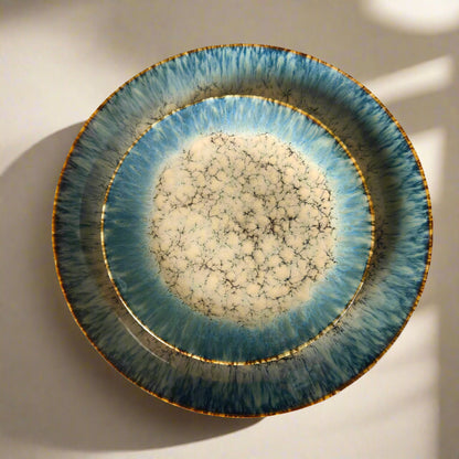 Decorative ceramic plate with a unique texture on a patterned background