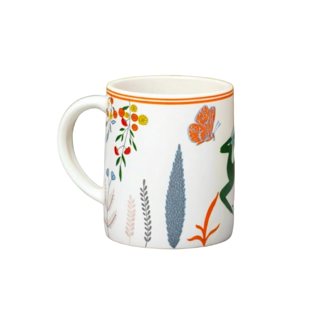 Mug with floral and nature-themed design on a gray background